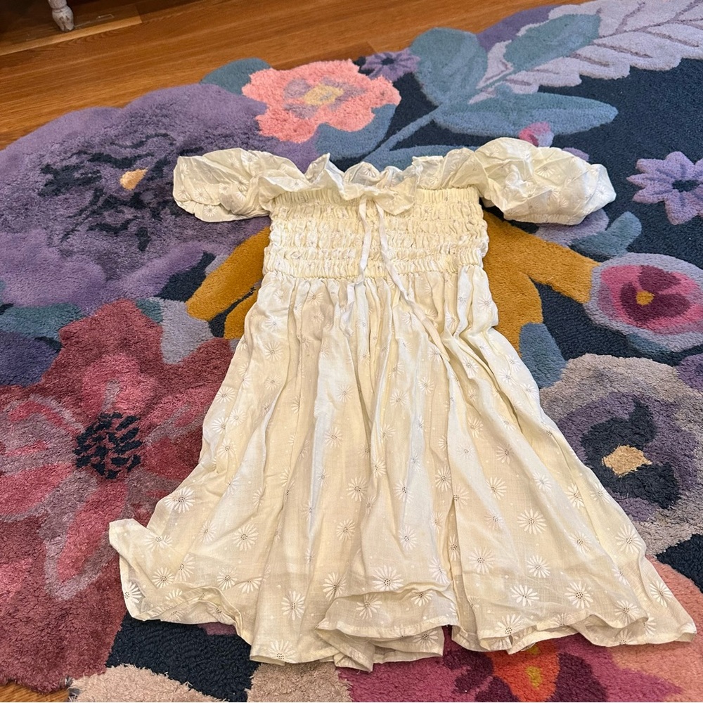 Pale yellow daisy mini dress